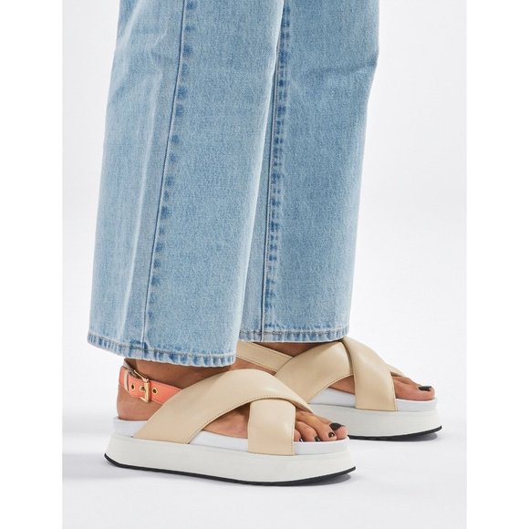 Inuikii Tan and White Criss-Cross Sandals - Picture 1 of 5